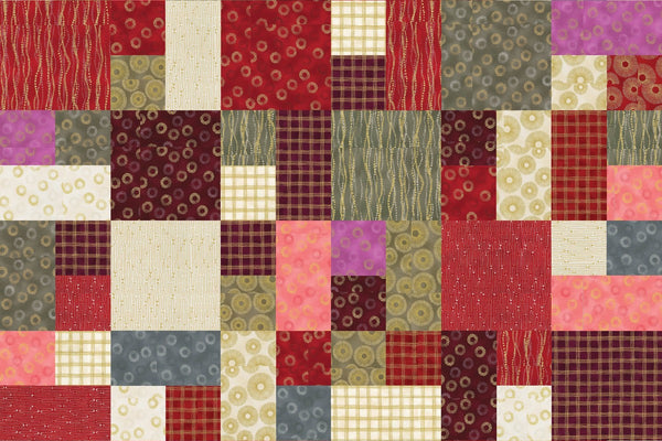 The Glimmer quilt, 36 by 48 inches, six blocks across and eight down in reds, plums, greys and creams, mixing pieced blocks with plain squares