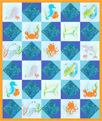 Sea Diamonds quilt in ocean blues, with fussy cut sea creature squares set between framed diamond blocks