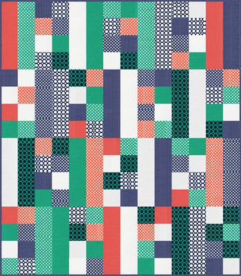 Blocka Dot quilt, a modern colour block patchwork of dot prints and solids in coral, green and navy