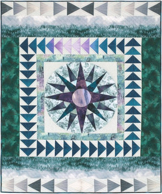 Enchanted Navigation medallion quilt with a mariner's compass star and flying geese borders in woodland tones