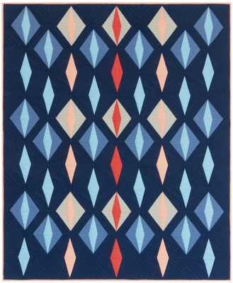 Floating Jewels quilt with bright jewels on a deep blue background