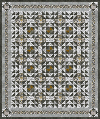 Lilypad quilt in the Onyx colourway with fan centres framed by sawtooth triangle rings in charcoal, cream and gold