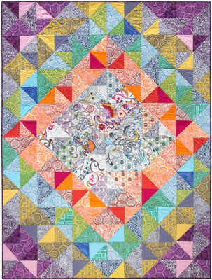 A modern throw quilt with a sense of movement, finished at 60 by 80 inches