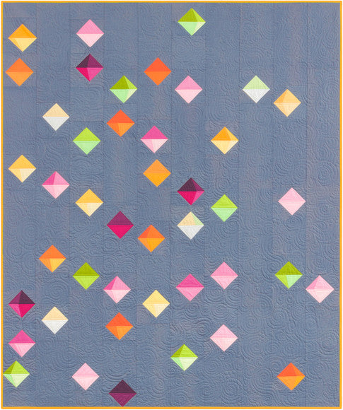 Floating Prisms free quilt pattern made from bright solid cottons