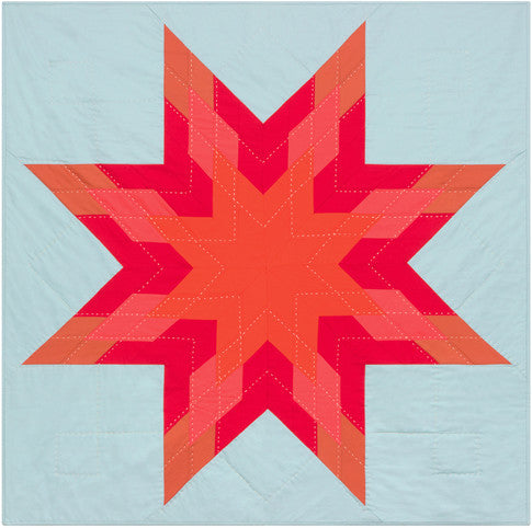 Red Star free quilt pattern, a bold star in warm reds and neutral solids