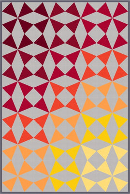 A soft ombre gradient quilt shifting from light to deep, finished at 66 by 98 inches