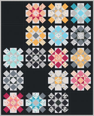 Starflower quilt, sixteen large star blocks in prints and solids set with sashing and four plain squares