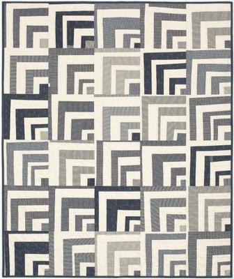 Half Way Home quilt with nested angular log cabin blocks in navy, grey and cream