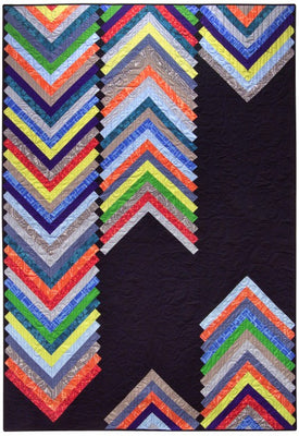 Winter free quilt pattern with a deep, moody wintry palette