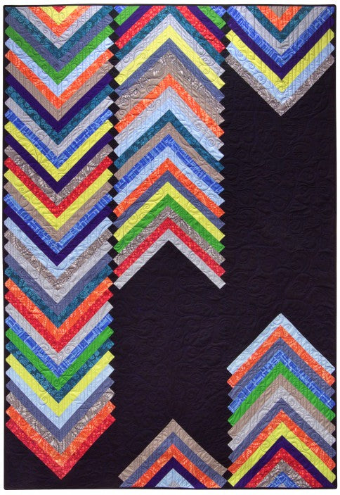 Winter free quilt pattern with a deep, moody wintry palette