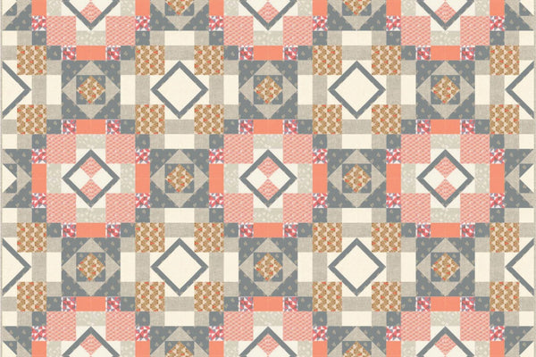 Fractured Fragments quilt in coral, gray and ivory, thirty-six pieced blocks forming a lattice of pale diamonds with diagonal bars running to the edges
