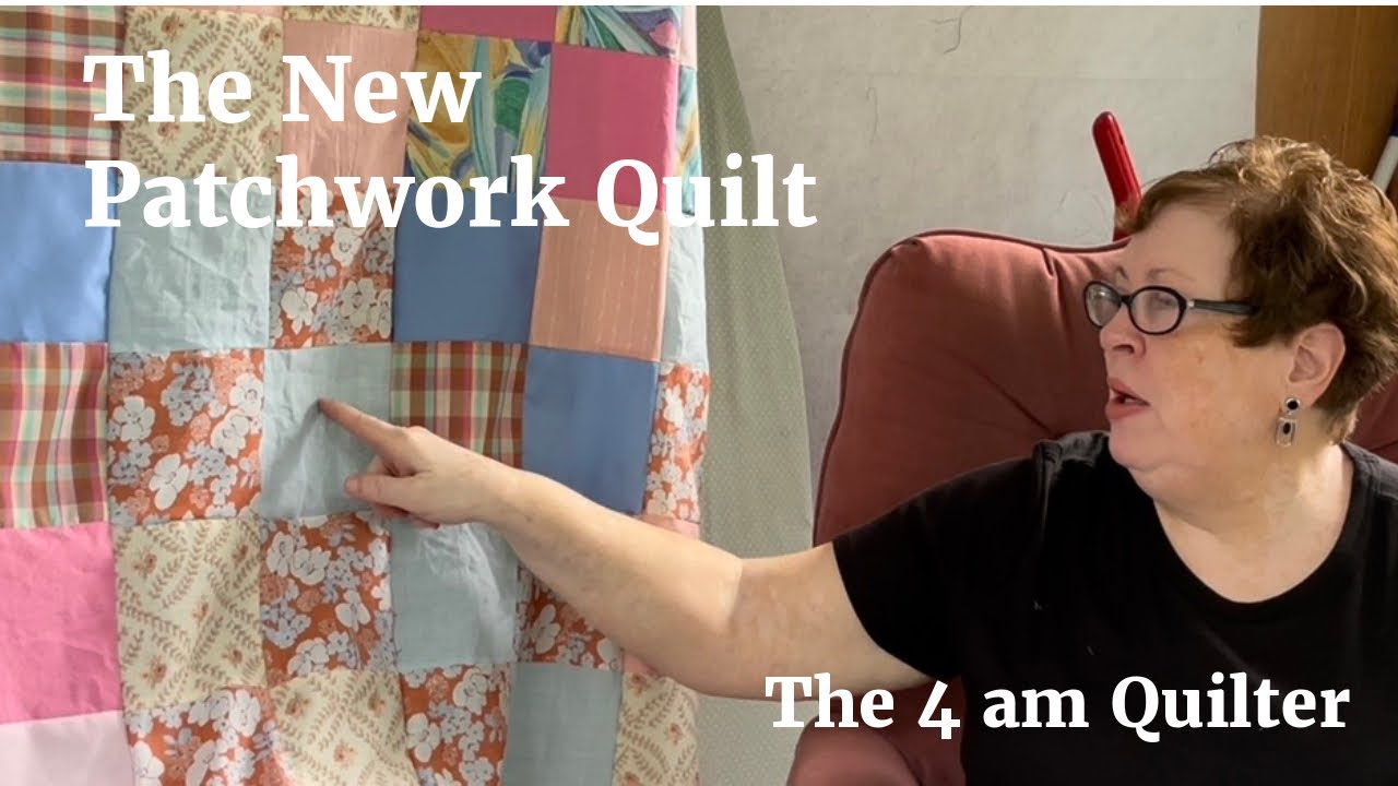 A new patchwork quilt top beside an older patchwork quilt