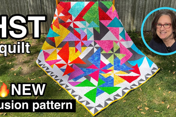 A stunning half square triangle illusion quilt