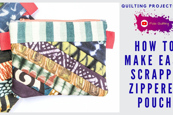 zipper pouches sewn from string pieced scrap panels with fabric tabs at the sides and at each end of the zipper