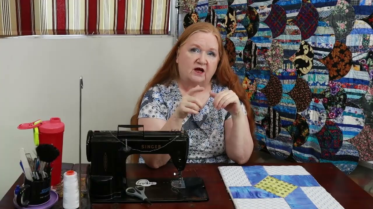 The Susannah quilt, a simple beginner friendly quilt made from small leftover pieces of fabric