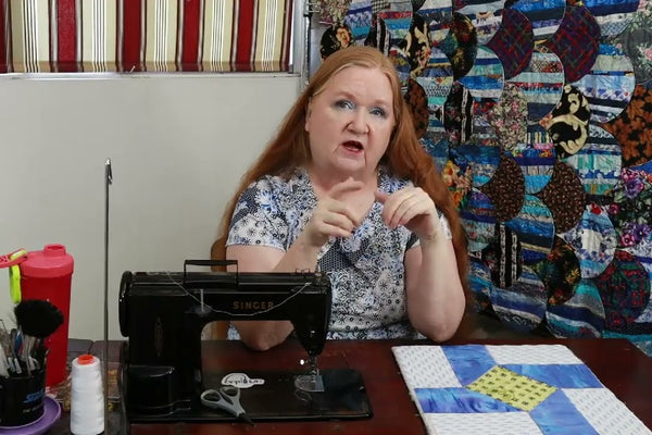 The Susannah quilt, a simple beginner friendly quilt made from small leftover pieces of fabric
