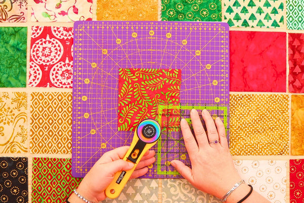 A fast charm square quilt made from 5 inch squares for Christmas in July