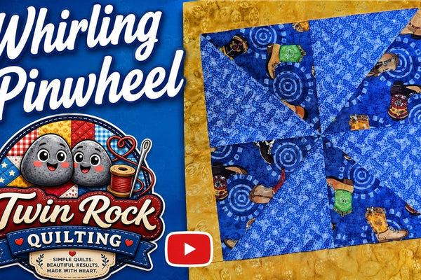 A Whirling Pinwheel Quilt Block That Looks Like It Is Spinning