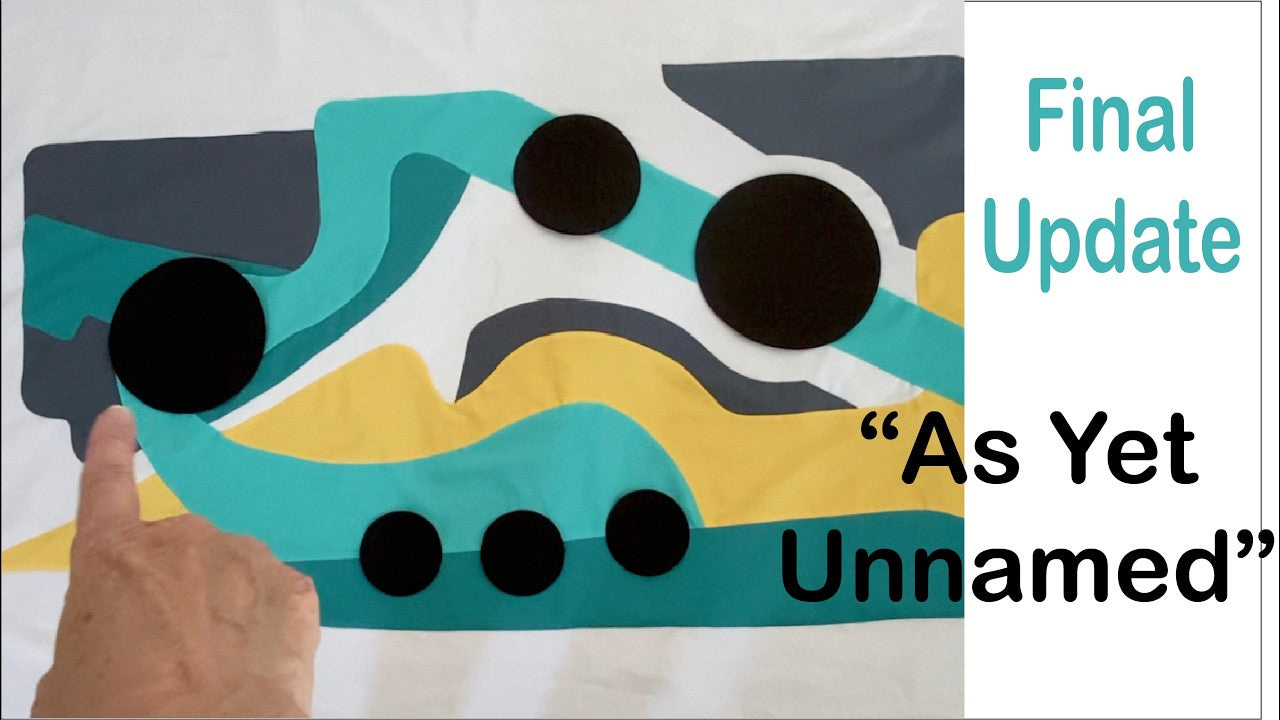 A fabric circle prepared for applique over a card template