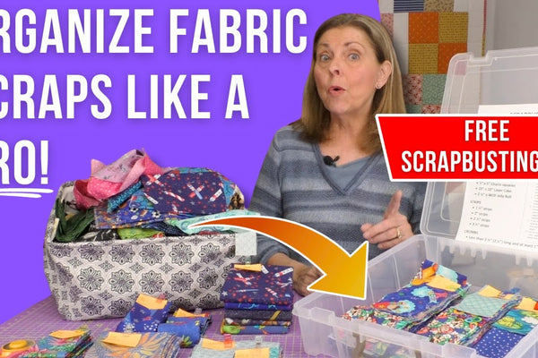 Leftover fabric pieces being cut down to useful squares and strips on a cutting mat
