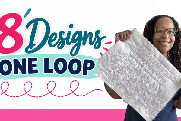 Mary of Mary Go Round Quilts stitching a row of loops on a sit down quilting machine