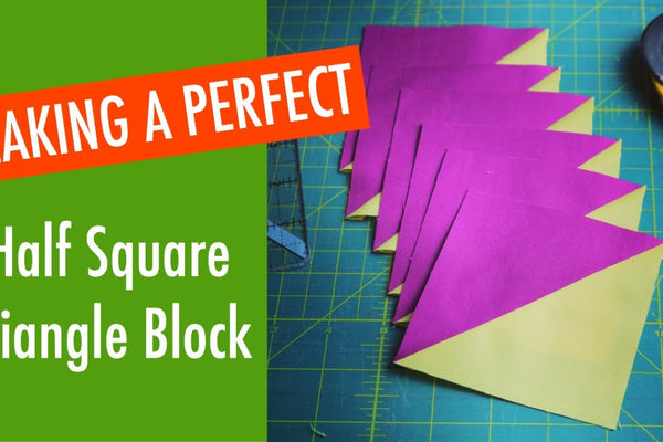 Karen Brown of Just Get it Done Quilts trimming a half square triangle block