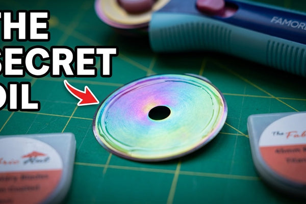 Changing a 45mm rotary cutter blade safely and wiping off the packing oil