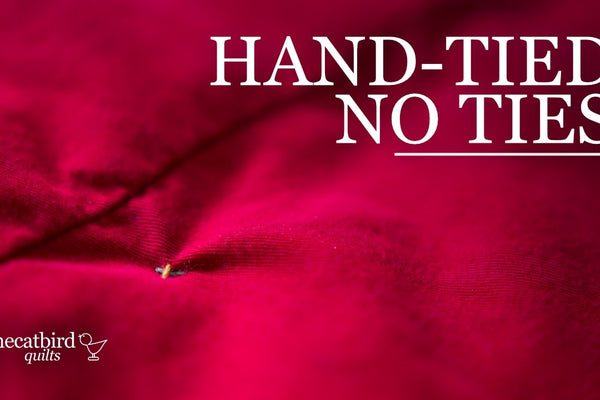 Tying a quilt with the knot hidden inside for a clean top and full loft