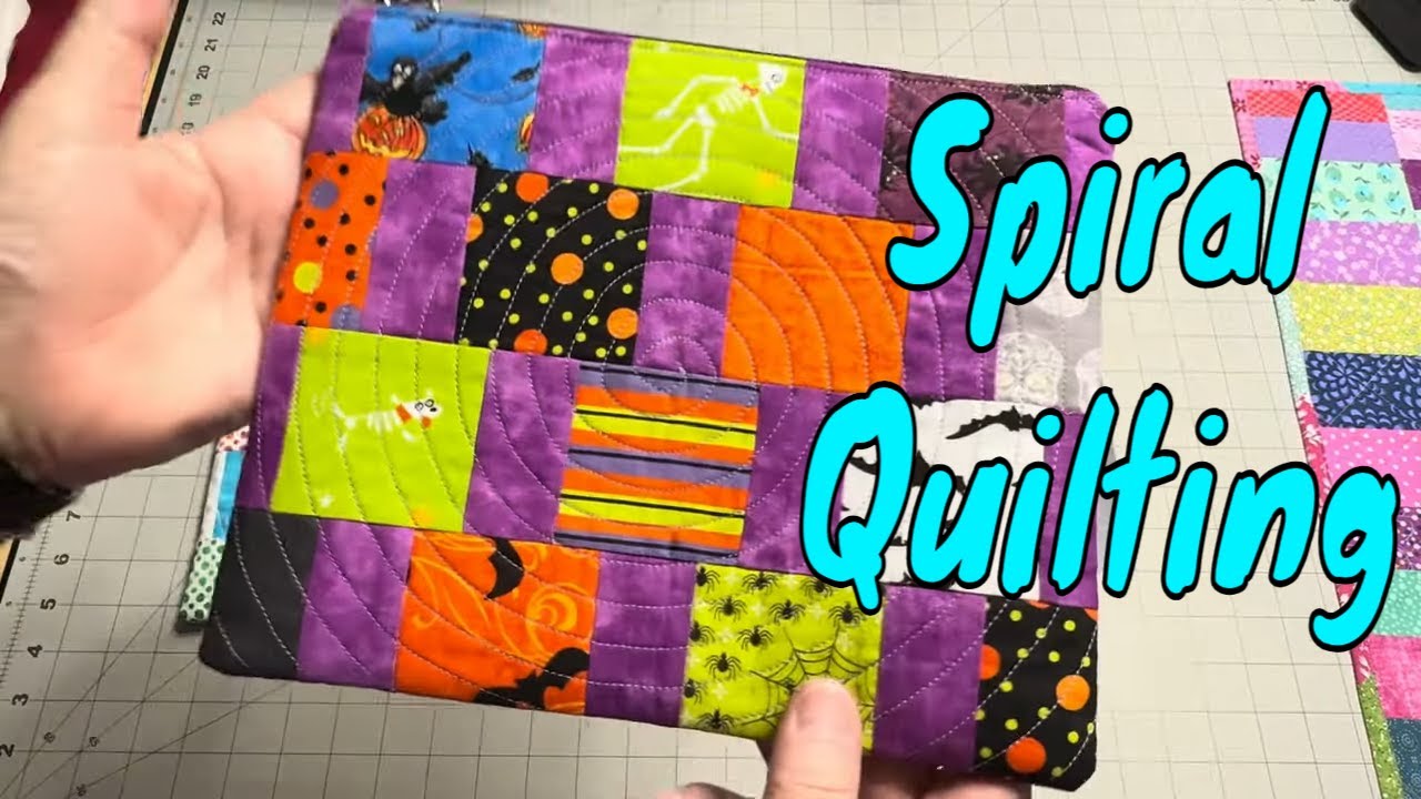 Spiral quilting on a handmade zipper pouch