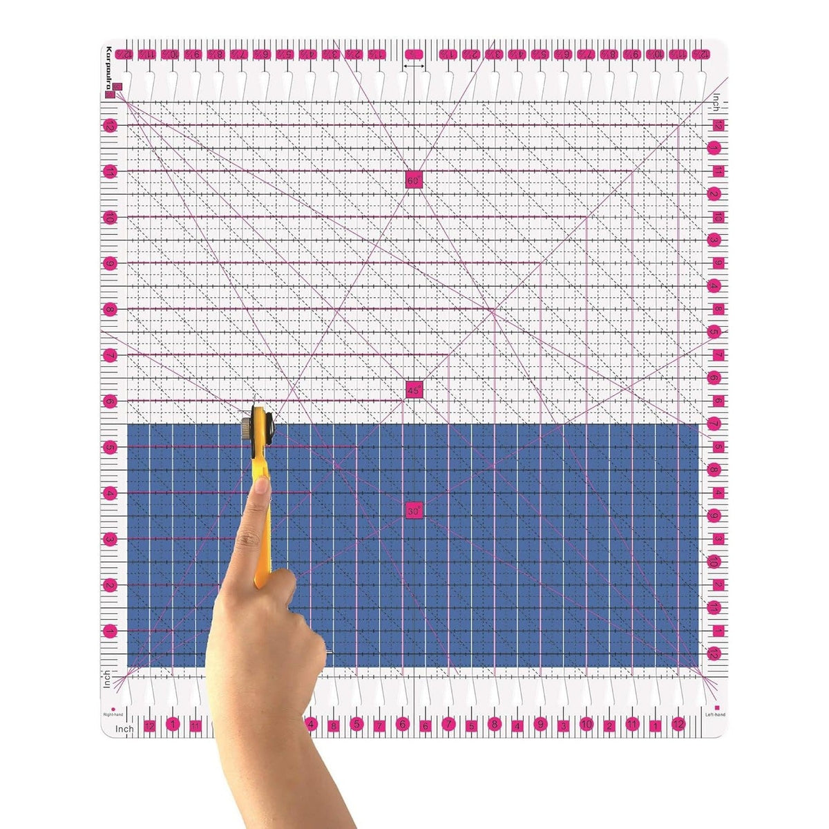 12.5 inch by 12.5 inch slotted quilting ruler, clear acrylic with grooved cutting slots, shown squaring up a quilt block - The Fabric Hut