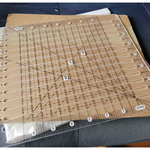 10 inch by 8 inch slotted quilting ruler, clear acrylic with measured slots for cutting 2.5 inch strips - The Fabric Hut