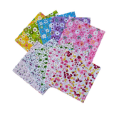 Patchwork Carnival charm pack with 240 precut 5 inch cotton squares across six packs