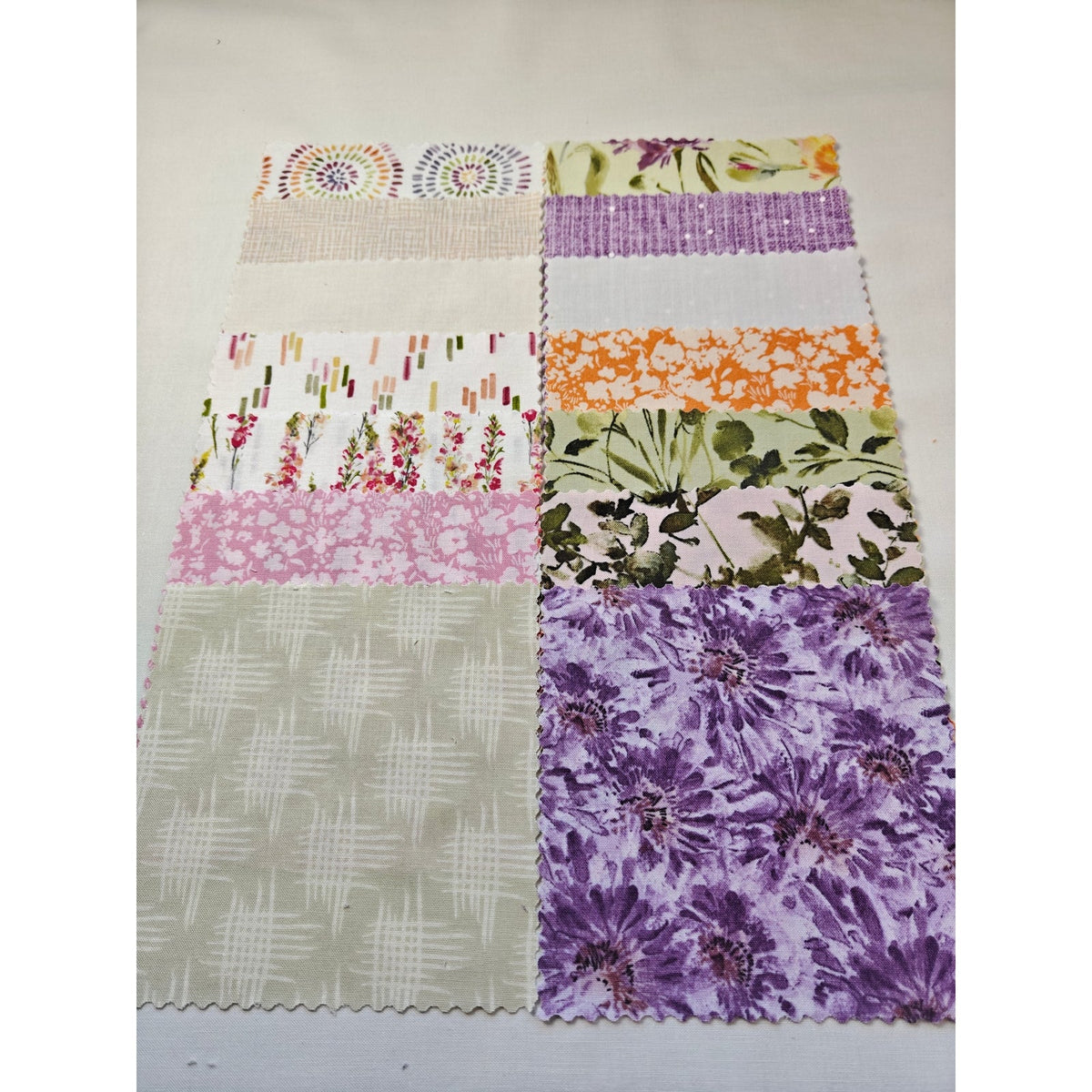 Meadowlands charm pack, 56 precut 5 inch squares from the Flourish collection by FIGO Fabrics