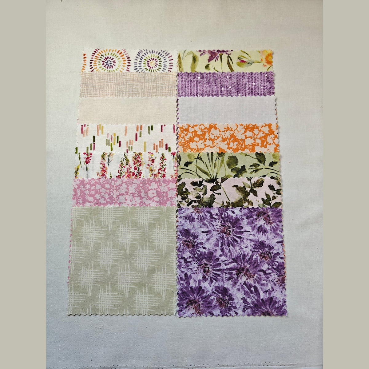 Meadowlands charm pack, 56 pre-cut 5 inch cotton squares from the FIGO Flourish collection - The Fabric Hut