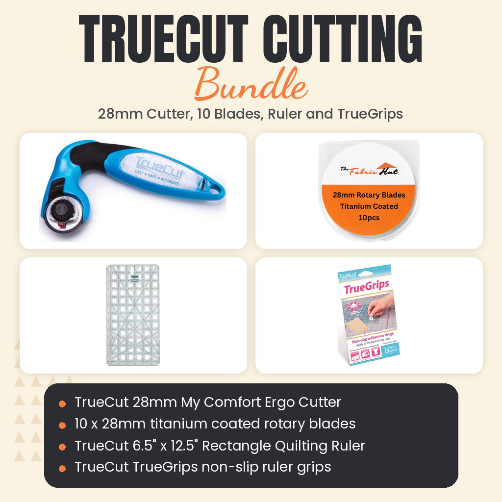 TrueCut Cutting Bundle, 28mm My Comfort Ergo Cutter, 10 Titanium Blades, 6.5 x 12.5 inch Rectangle Ruler and TrueGrips - TrueCut 28mm My Comfort Ergo Cutter, ten 28mm titanium blades, TrueCut 6.5" x 12.5" Rectangle Quilting Ruler and TrueGrips - photo 1 of 5 - The Fabric Hut