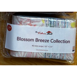 Blossom Breeze mini strips laid out to show the full range of coordinating cotton prints