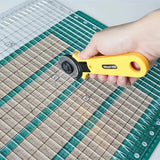 10 inch by 8 inch slotted quilting ruler, clear acrylic with measured slots for cutting 2.5 inch strips - The Fabric Hut
