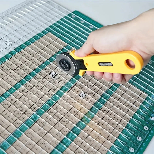 10 inch by 8 inch slotted quilting ruler, clear acrylic with measured slots for cutting 2.5 inch strips - The Fabric Hut