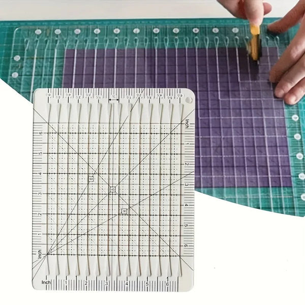 10 inch by 8 inch slotted quilting ruler, clear acrylic with measured slots for cutting 2.5 inch strips - The Fabric Hut