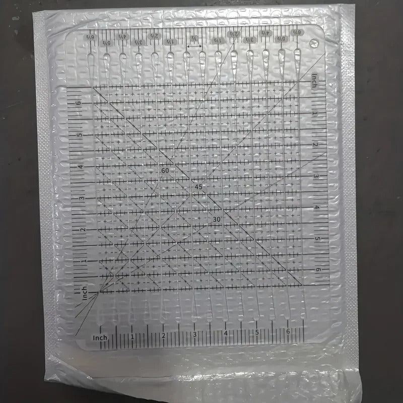 10 inch by 8 inch slotted quilting ruler, clear acrylic with measured slots for cutting 2.5 inch strips - The Fabric Hut