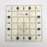 The Fabric Hut 6 inch clear acrylic square quilting ruler with inch markings and 30, 45 and 80 degree angle lines, included free with this 480 piece charm square bundle